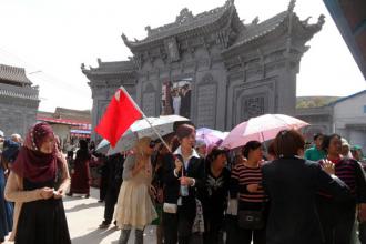 十里牡丹醉賓客 千年磚雕綻神韻